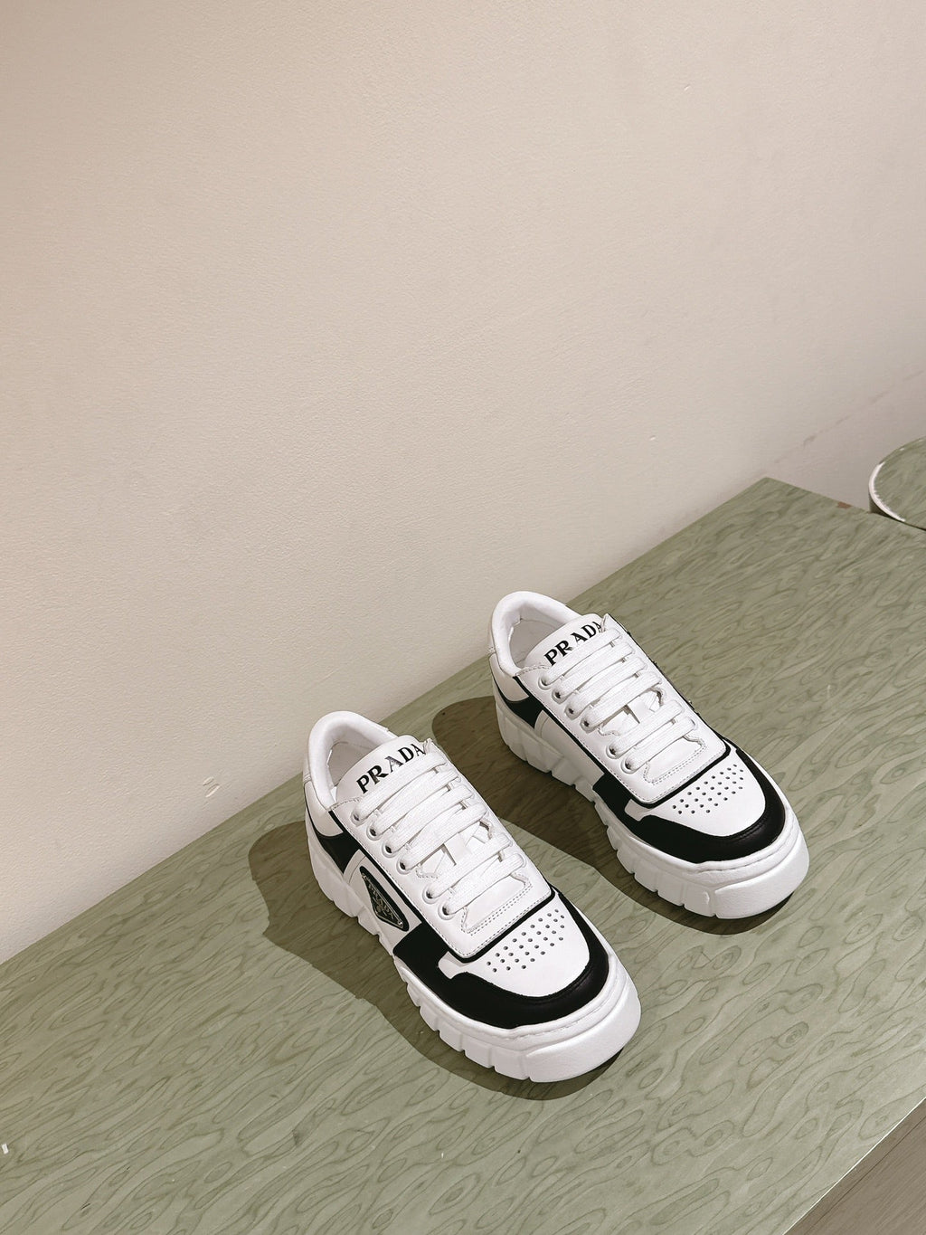 PRADA FLATFORM SNEAKERS BLACK AND WHITE CALFSKIN