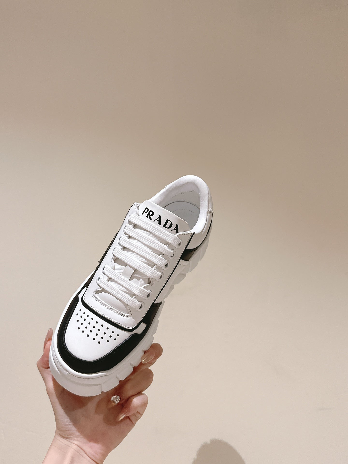 PRADA FLATFORM SNEAKERS BLACK AND WHITE CALFSKIN