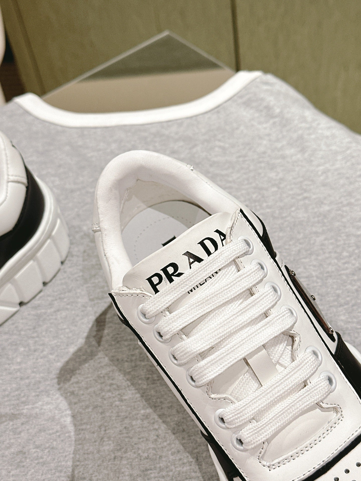 PRADA FLATFORM SNEAKERS BLACK AND WHITE CALFSKIN