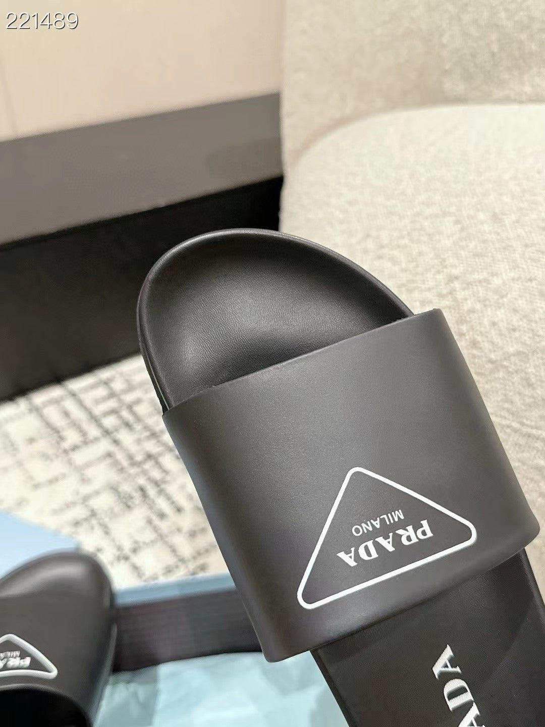PRADA 25S RUBBER SLIDE IN BLACK CALFSKIN WITH LOGO