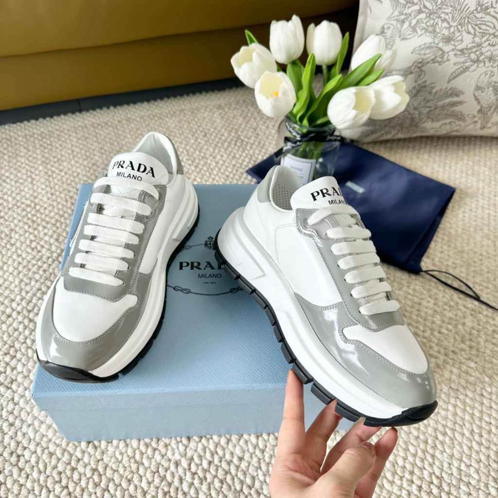 PRADA BLACK THICK SOLE SNEAKER GRAY AND WHITE CALFSKIN