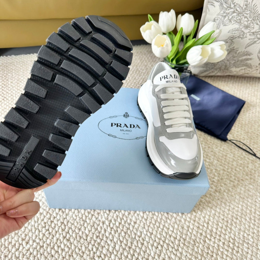 PRADA BLACK THICK SOLE SNEAKER GRAY AND WHITE CALFSKIN