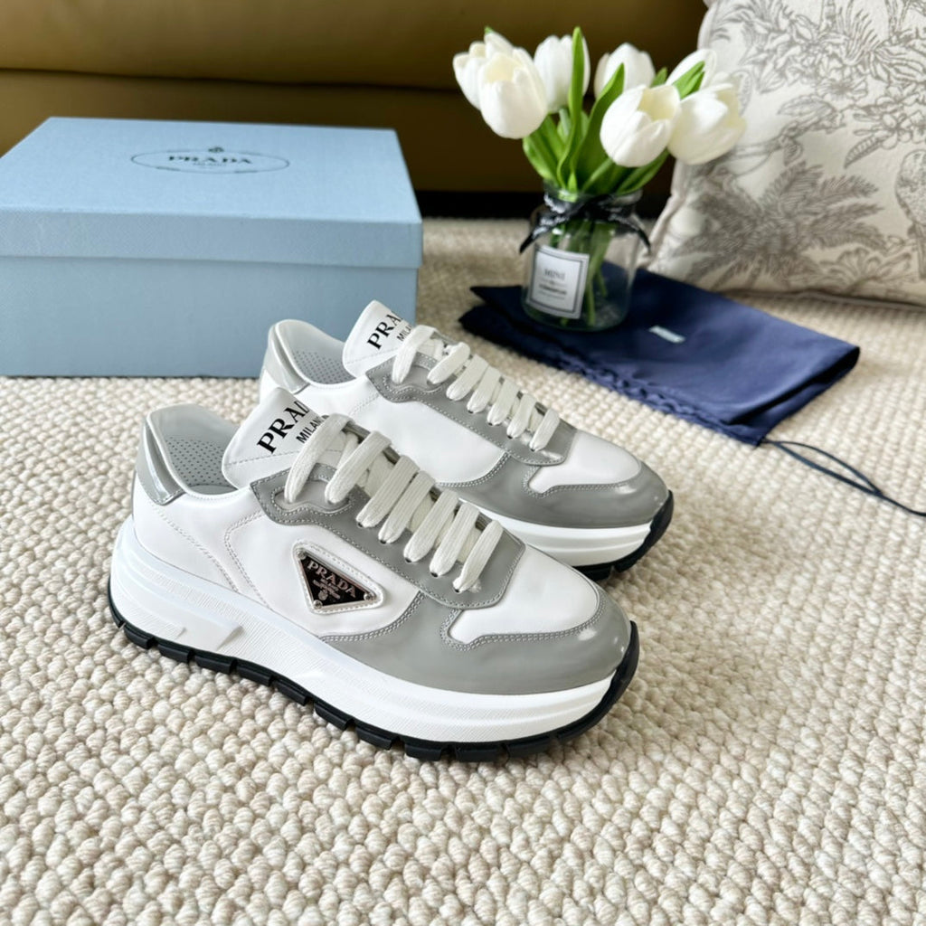 PRADA BLACK THICK SOLE SNEAKER GRAY AND WHITE CALFSKIN