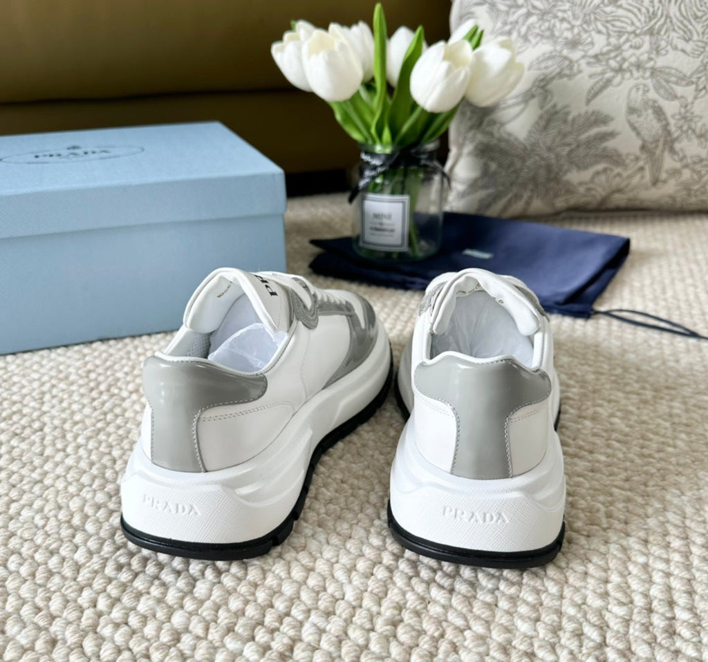 PRADA BLACK THICK SOLE SNEAKER GRAY AND WHITE CALFSKIN