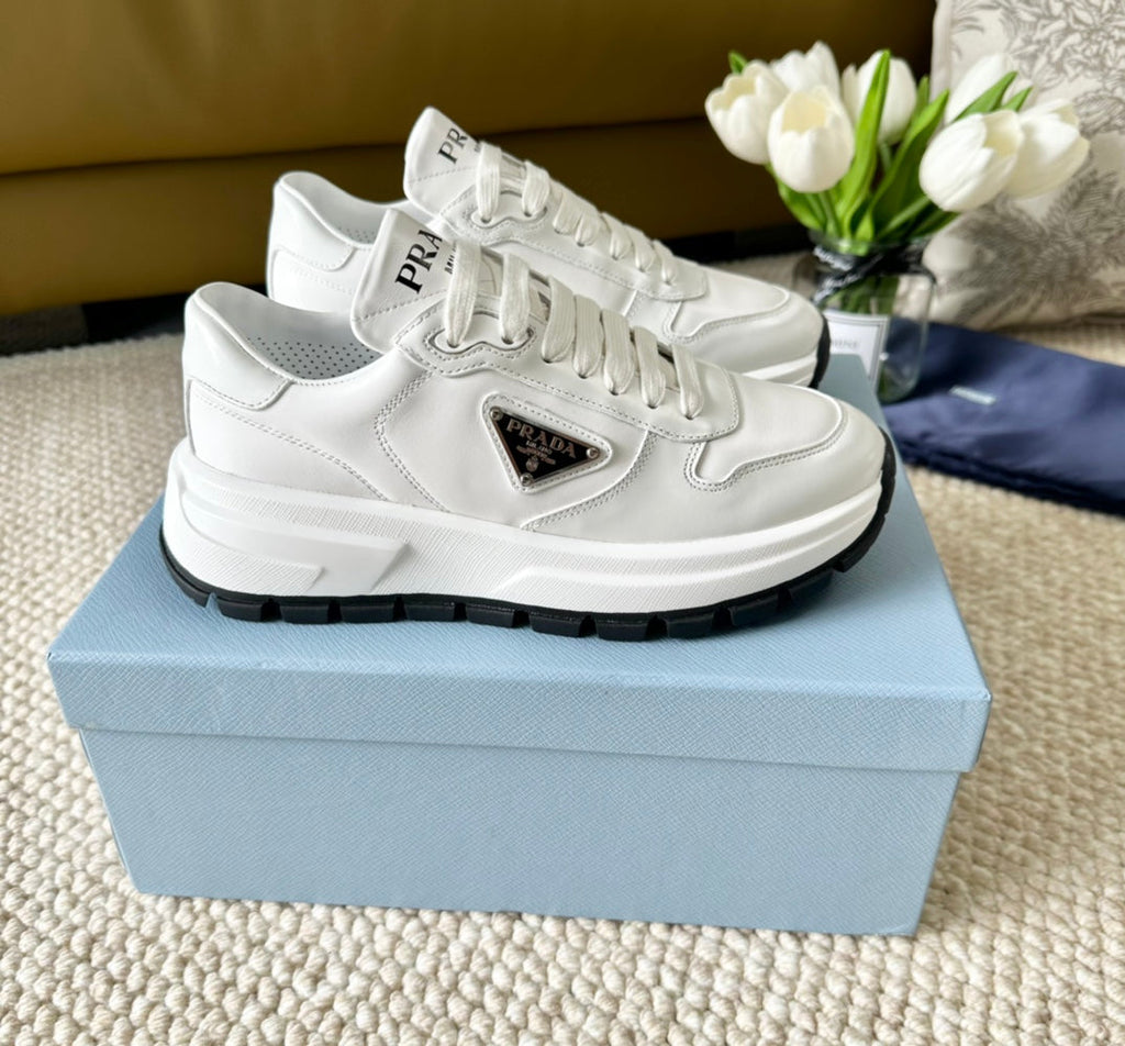 PRADA THICK SOLE SNEAKER WHITE AND BLACK LOGO CALFSKIN
