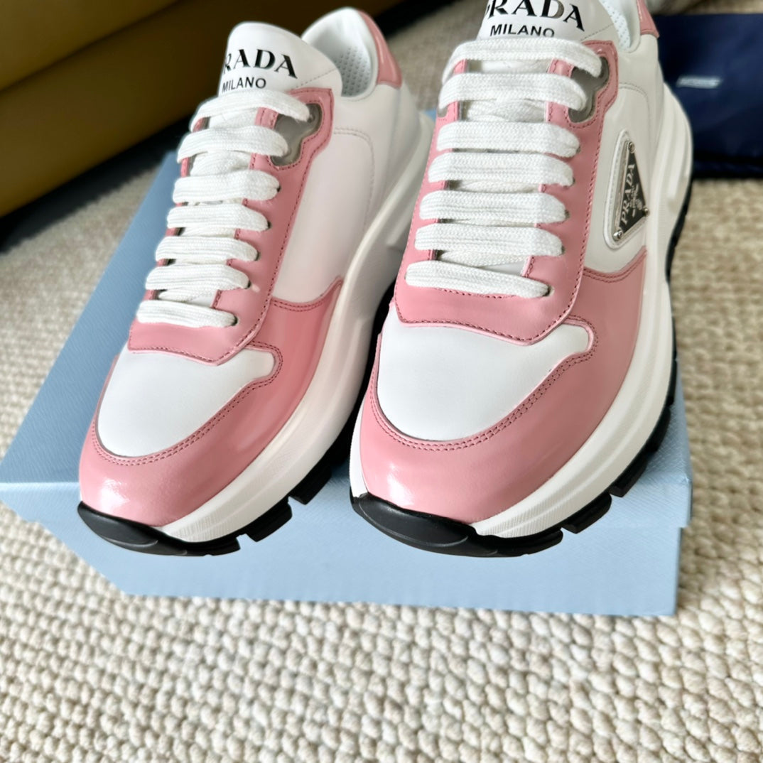 PRADA THICK SOLE SNEAKER WHITE AND PINK CALFSKIN