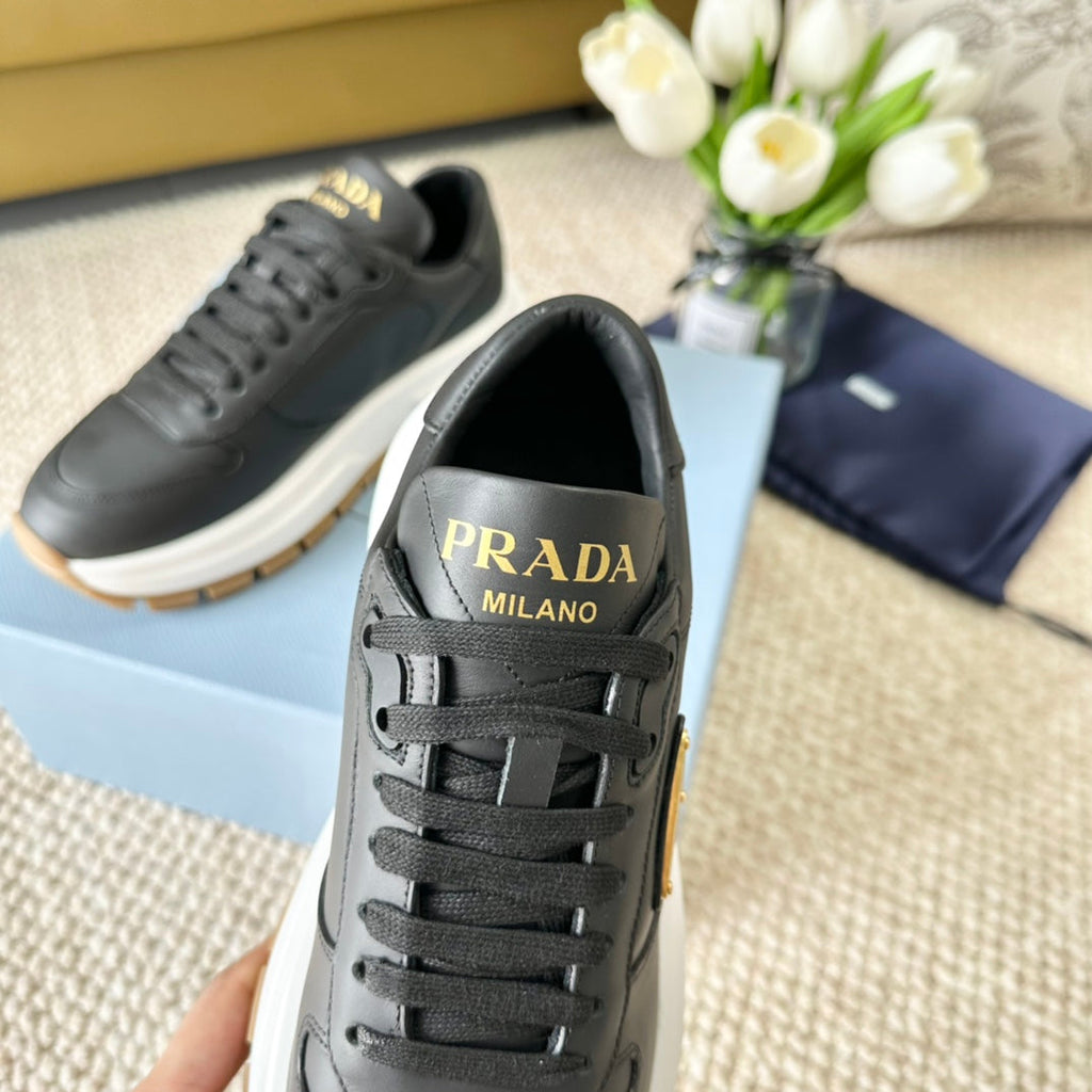 PRADA THICK SOLE SNEAKER BLACK CALFSKIN