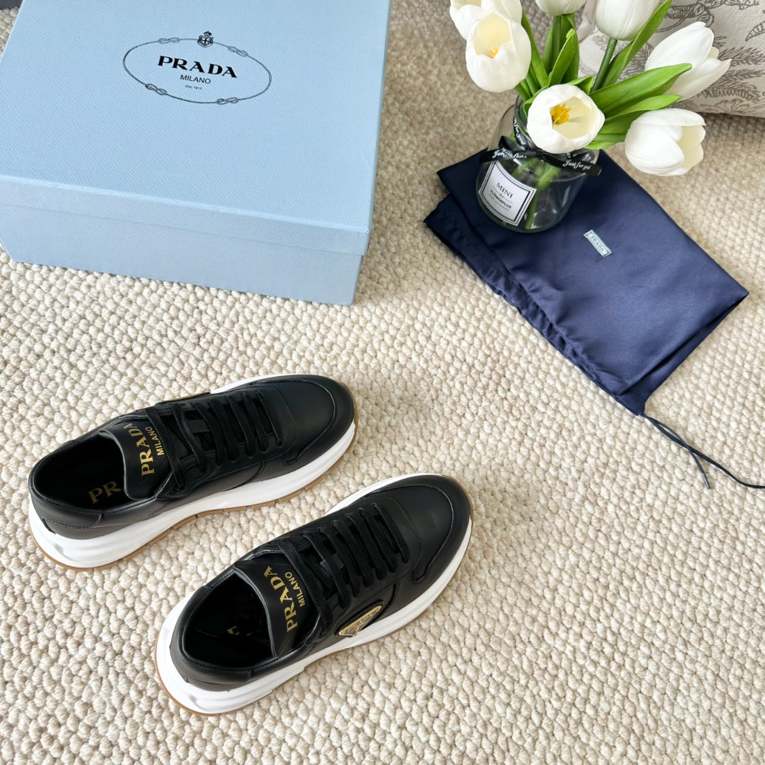 PRADA THICK SOLE SNEAKER BLACK CALFSKIN
