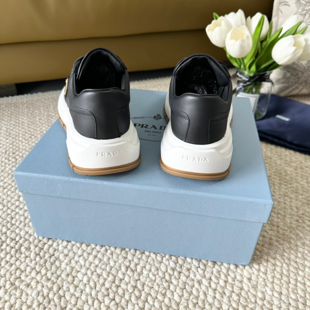 PRADA THICK SOLE SNEAKER BLACK CALFSKIN