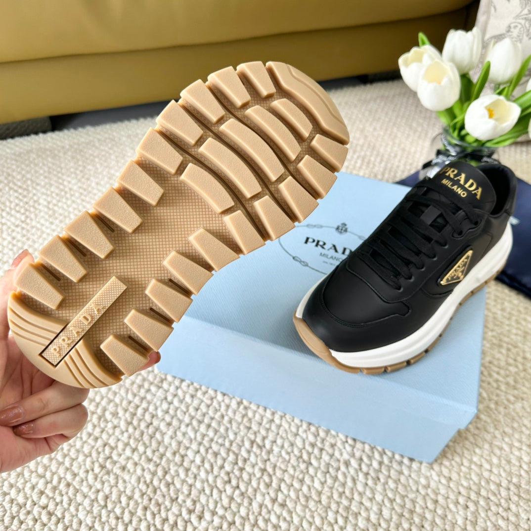 PRADA THICK SOLE SNEAKER BLACK CALFSKIN