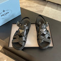 PRADA CRISSCROSS RUBBER SANLS BLACK CALFSKIN