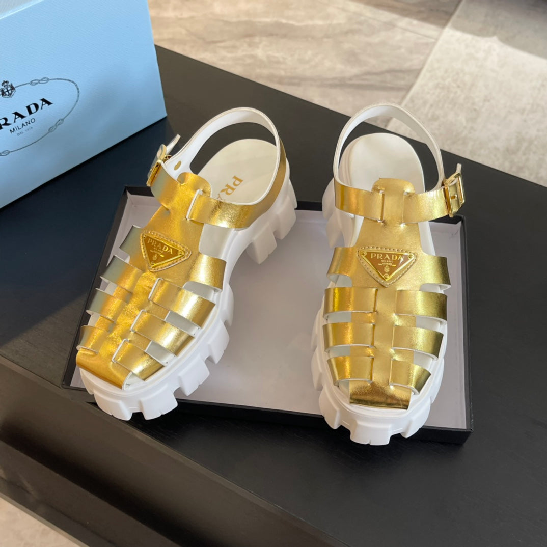 PRADA RUBBER MONOLITH SANLS METALLIC GOLD CALFSKIN