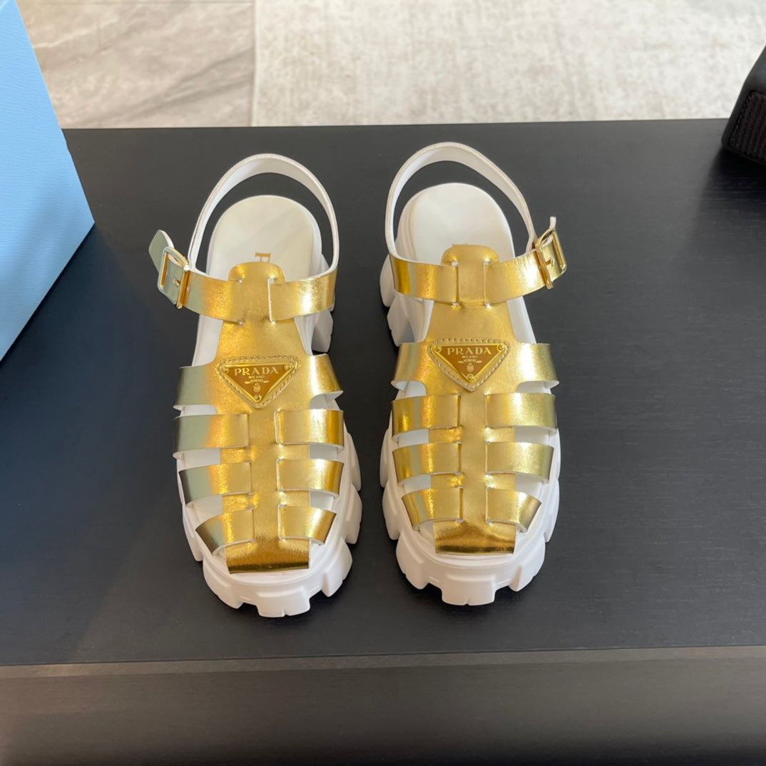 PRADA RUBBER MONOLITH SANLS METALLIC GOLD CALFSKIN