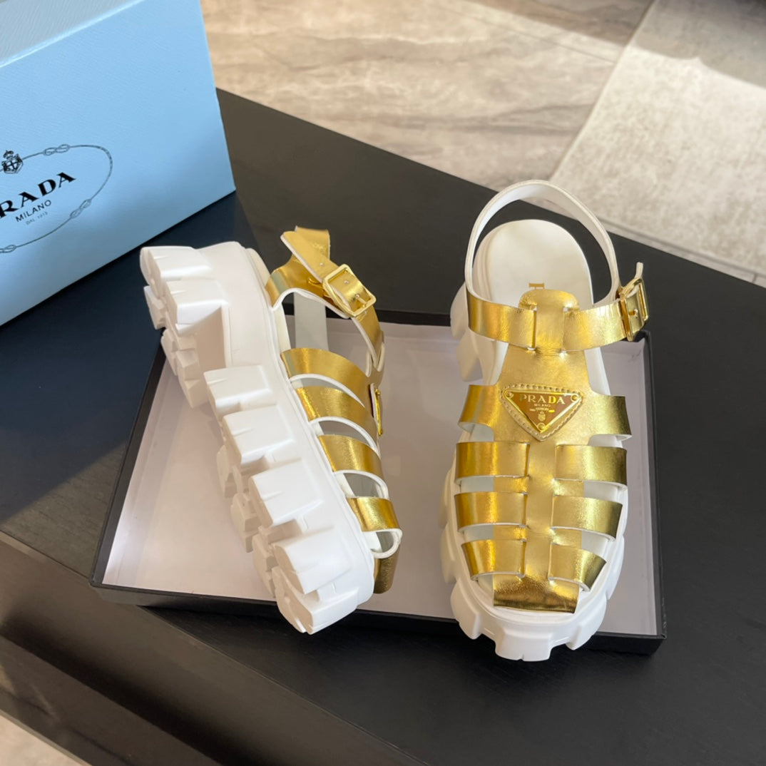 PRADA RUBBER MONOLITH SANLS METALLIC GOLD CALFSKIN