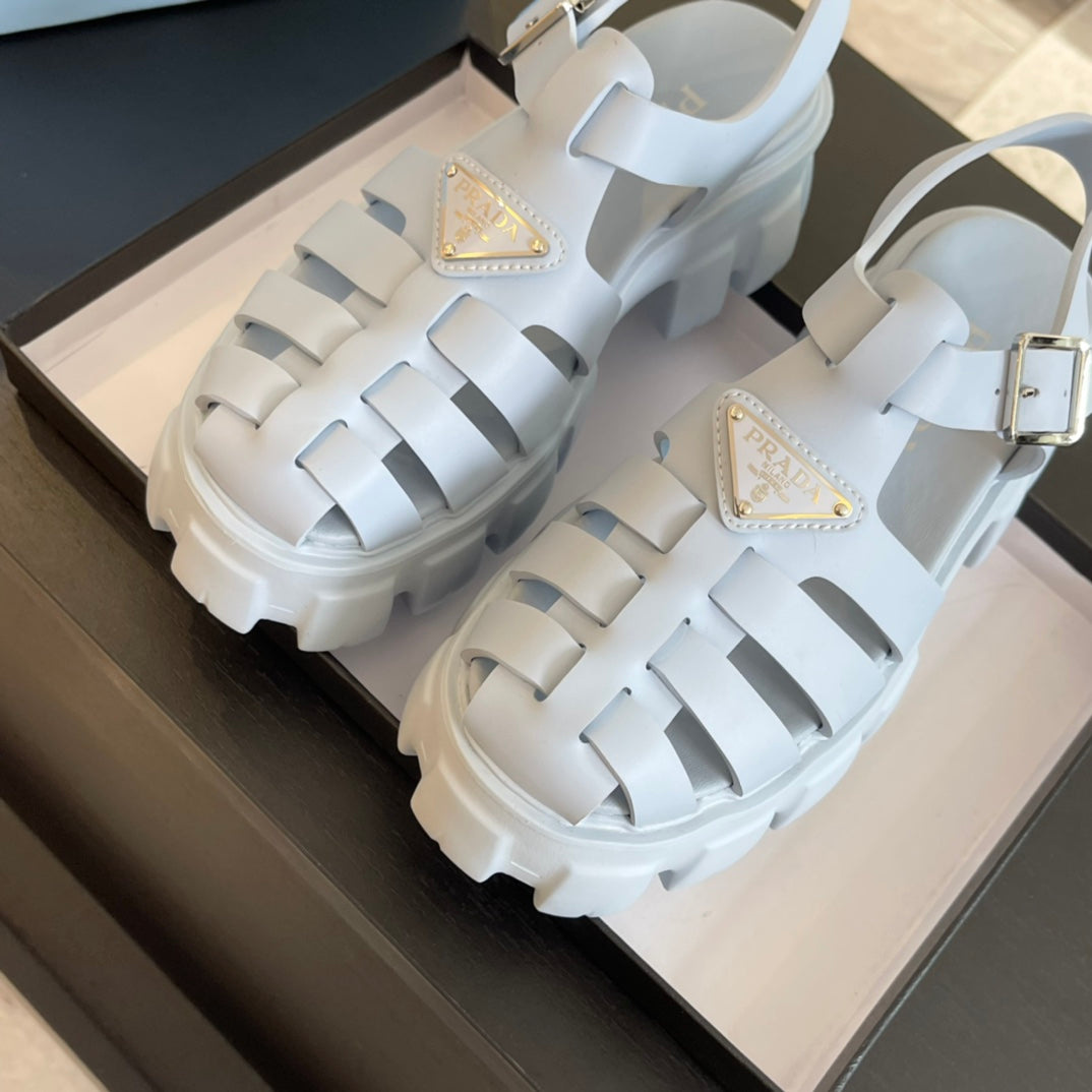 PRADA RUBBER MONOLITH SANLS PASTEL BLUE CALFSKIN