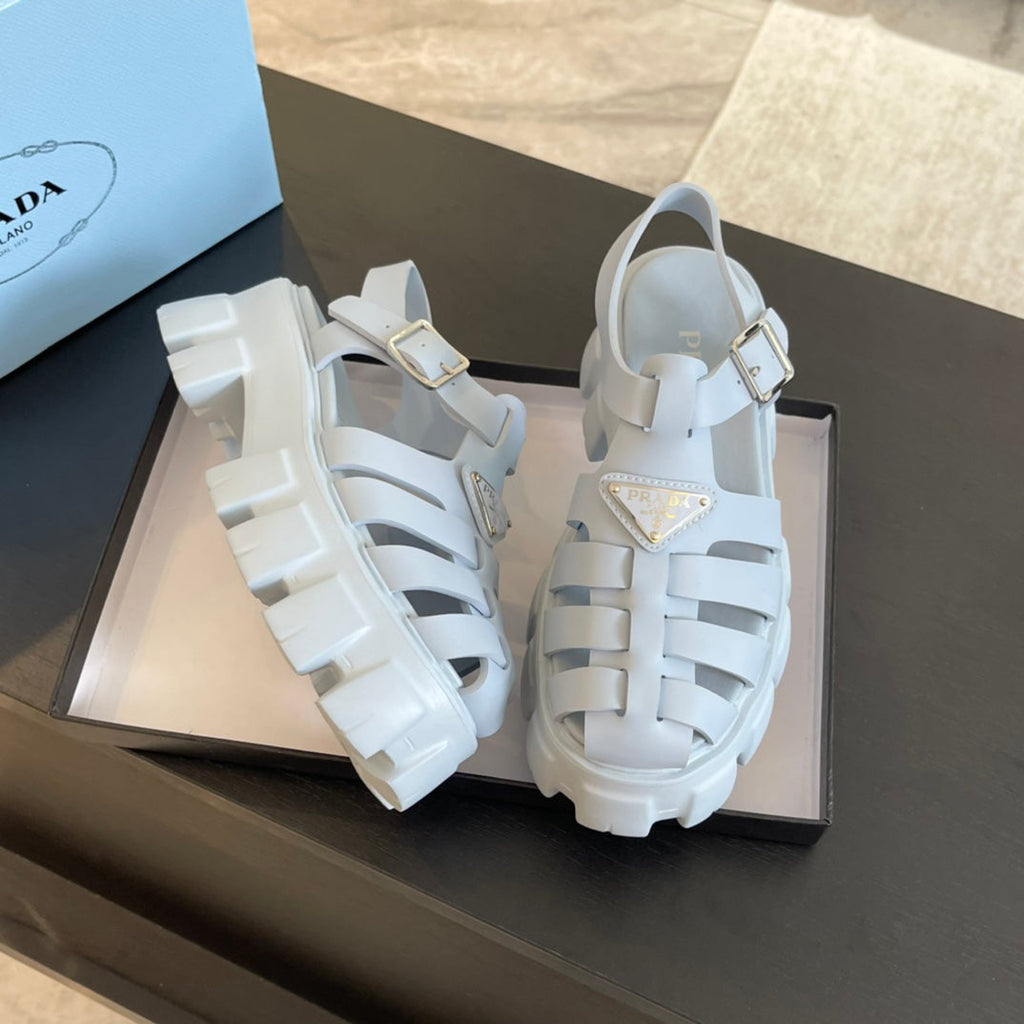 PRADA RUBBER MONOLITH SANLS PASTEL BLUE CALFSKIN