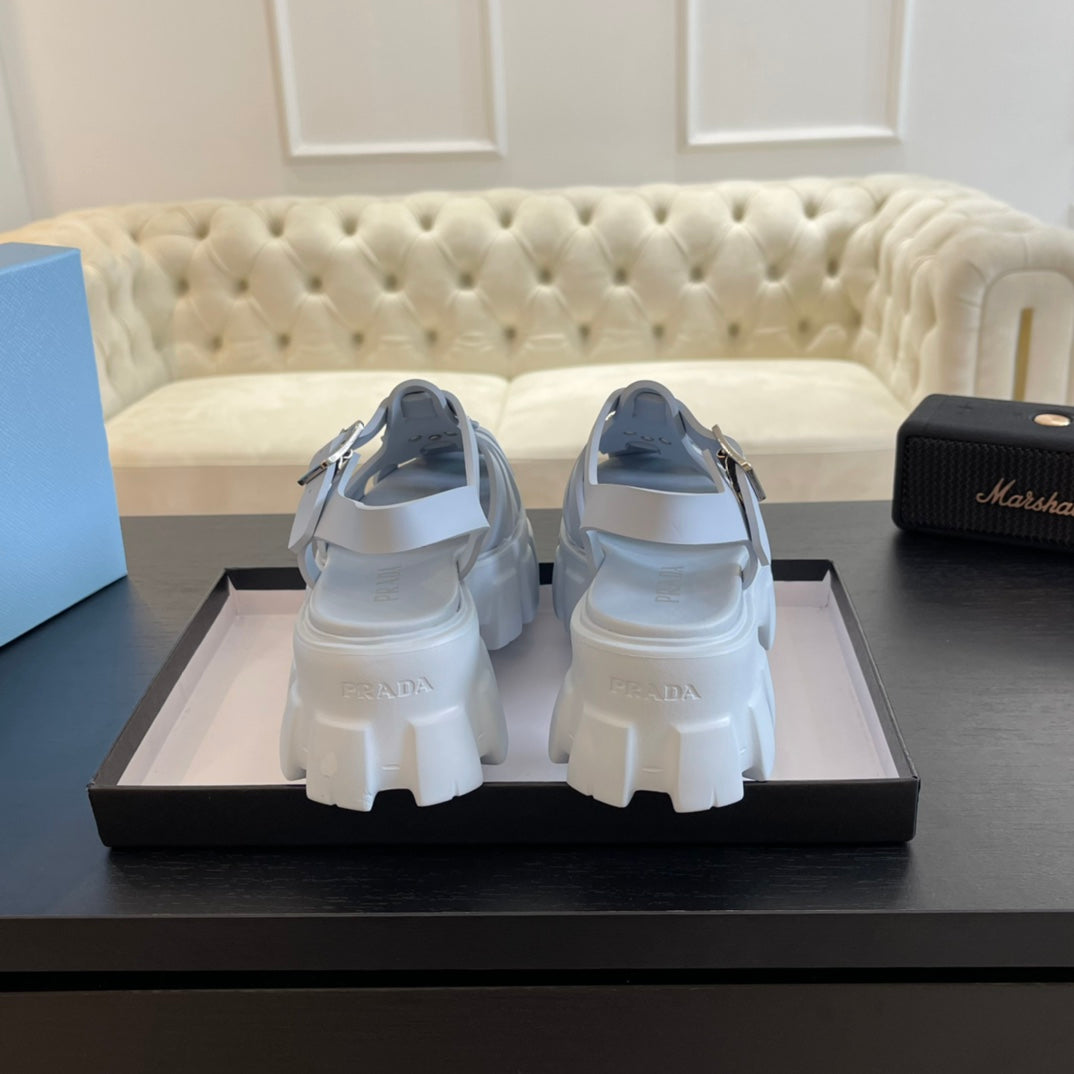 PRADA RUBBER MONOLITH SANLS PASTEL BLUE CALFSKIN