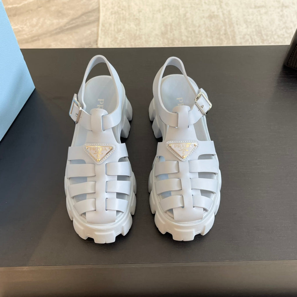 PRADA RUBBER MONOLITH SANLS PASTEL BLUE CALFSKIN