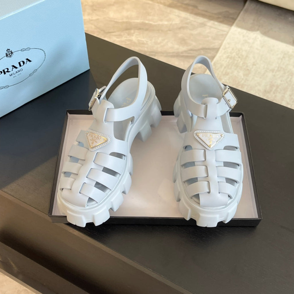 PRADA RUBBER MONOLITH SANLS PASTEL BLUE CALFSKIN