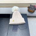 LOUIS VUITTON KNITTED BEANIE HAT IN LULLABY PINK WOOL AND FOX FUR 409792