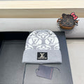 LOUIS VUITTON KNITTED BEANIE HAT IN LIGHT GRAY MIX WHITE WOOL AND RABBIT FUR 426242