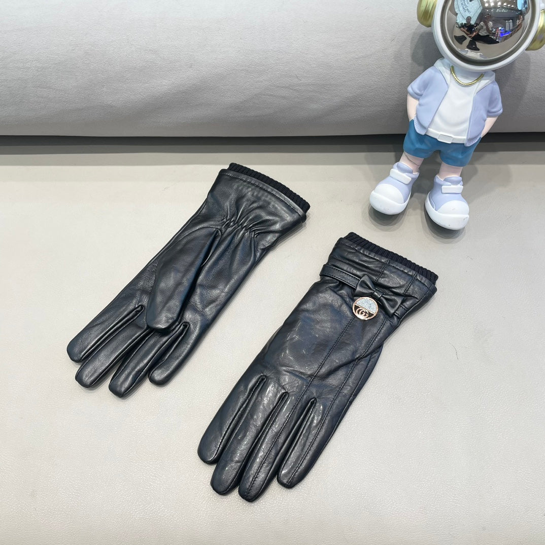 GUCCI GLOVES ATTACHED BOW IN BLACK LAMBSKIN AND WOOL 429202