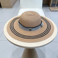CELINE WIDE BRIM HAT MODEL 650410 IN BROWN WITH BLACK STRIPES WOVEN STRAW