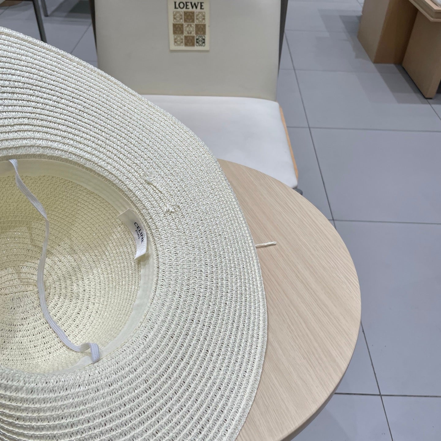 CELINE WIDE BRIM HAT MODEL 652186 IN WHITE WOVEN STRAW