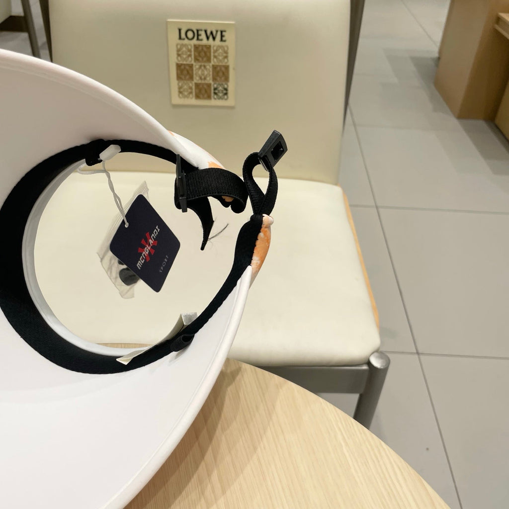 CELINE VISOR HAT MODEL 652202 IN ORANGE AND WHITE FABRIC
