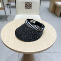 CELINE VISOR HAT MODEL 652215 IN BLACK WOVEN STRAW