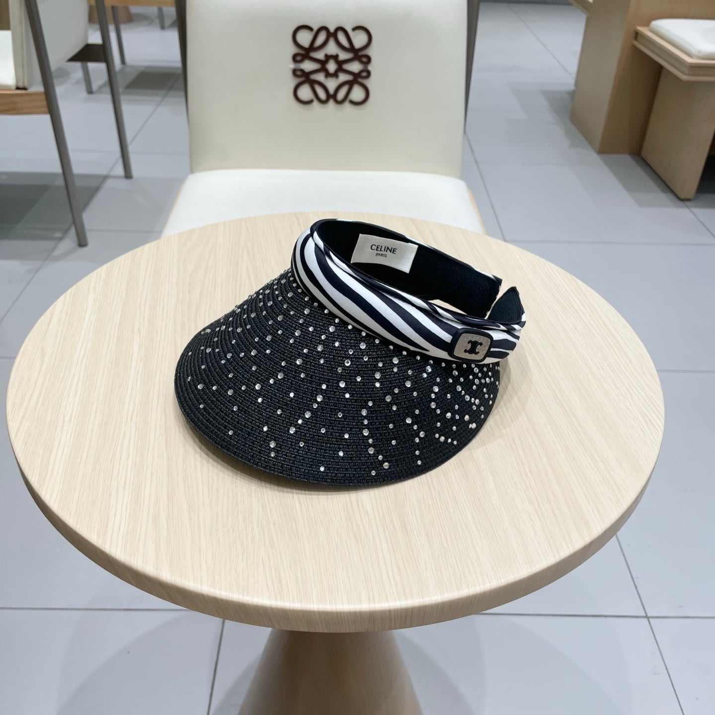 CELINE VISOR HAT MODEL 652215 IN BLACK WOVEN STRAW