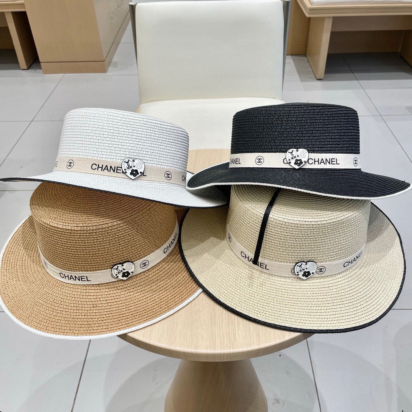 CHANEL FLAT STRAW HAT WHITE 672721