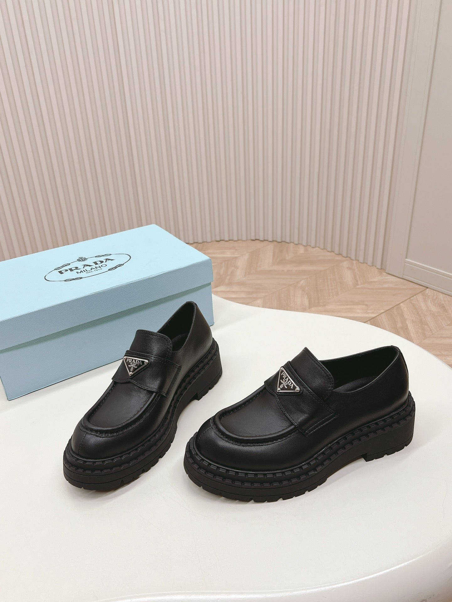 PRADA BRUSHED MONOLITH LOAFERS BLACK CALFSKIN