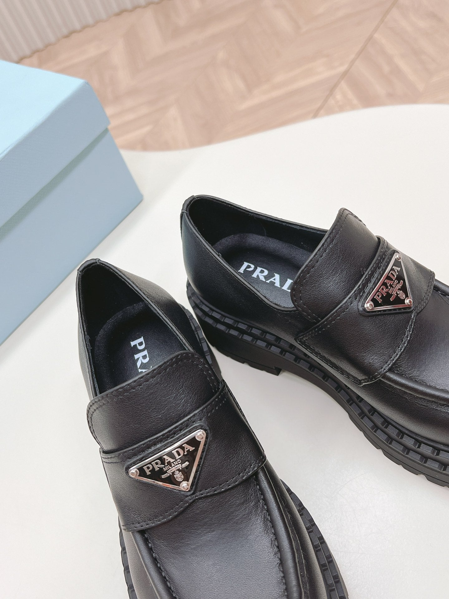 PRADA BRUSHED MONOLITH LOAFERS BLACK CALFSKIN