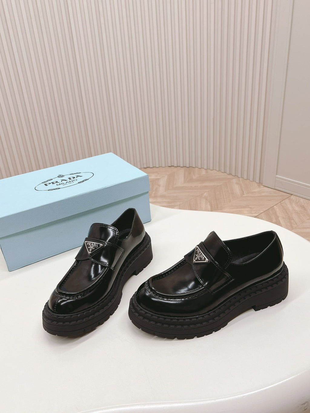 PRADA BRUSHED MONOLITH LOAFERS GLOSSY BLACK CALFSKIN