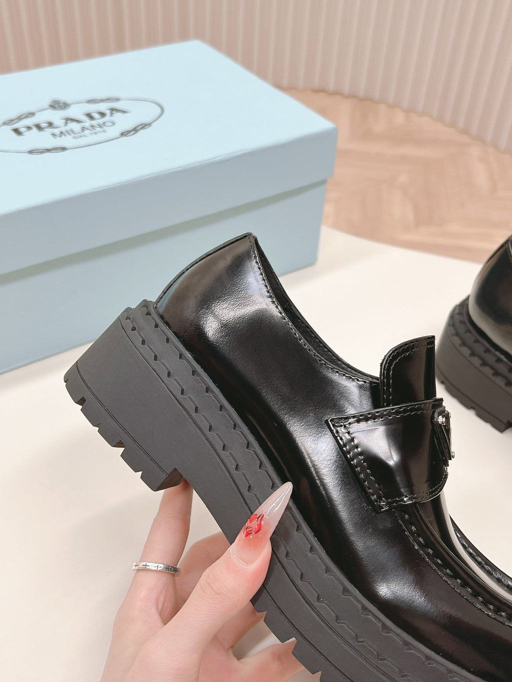 PRADA BRUSHED MONOLITH LOAFERS GLOSSY BLACK CALFSKIN