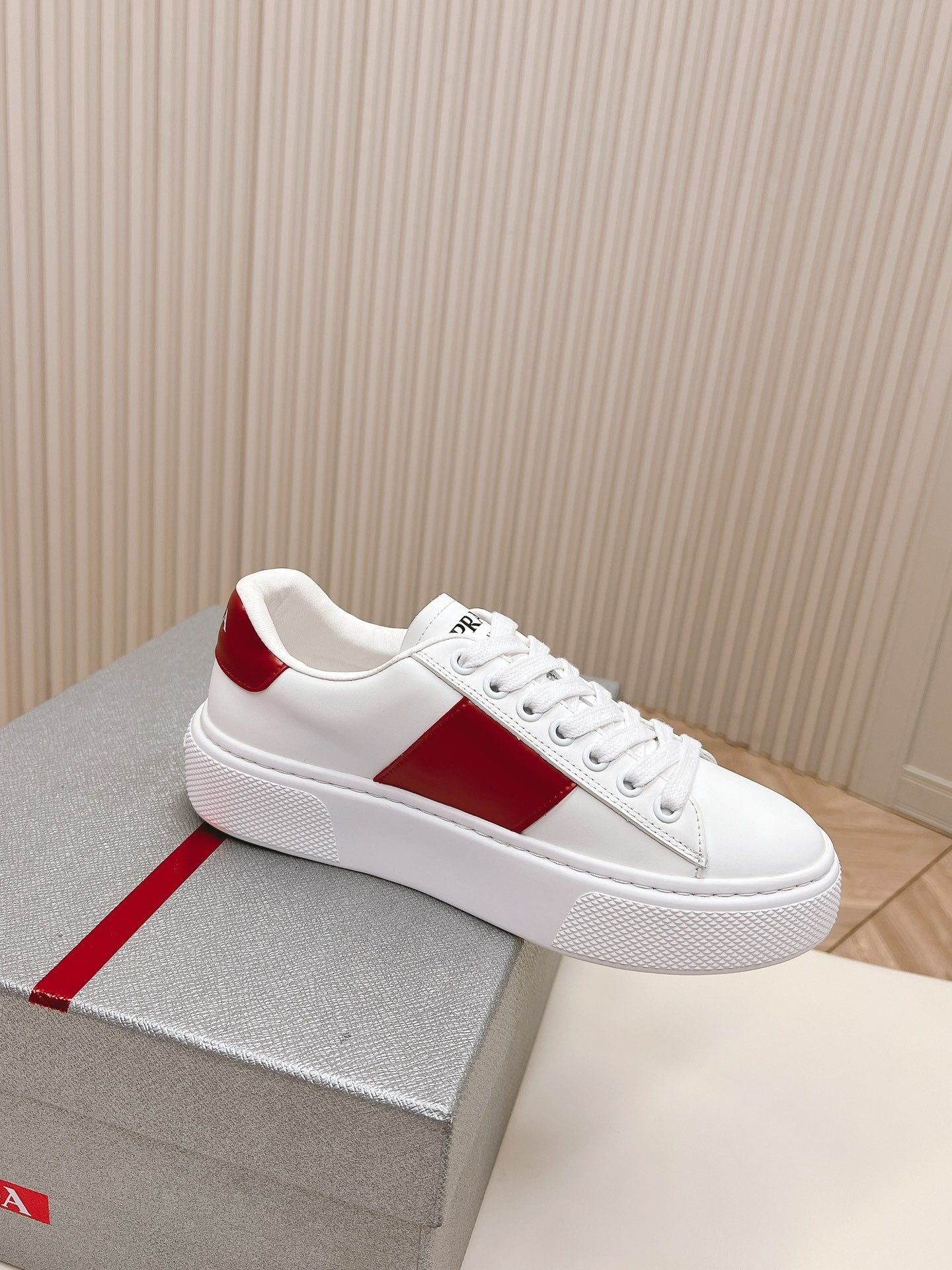 PRADA LEATHER LOGO OUTLET SNEAKERS BLACK AND CHERRY CALFSKIN