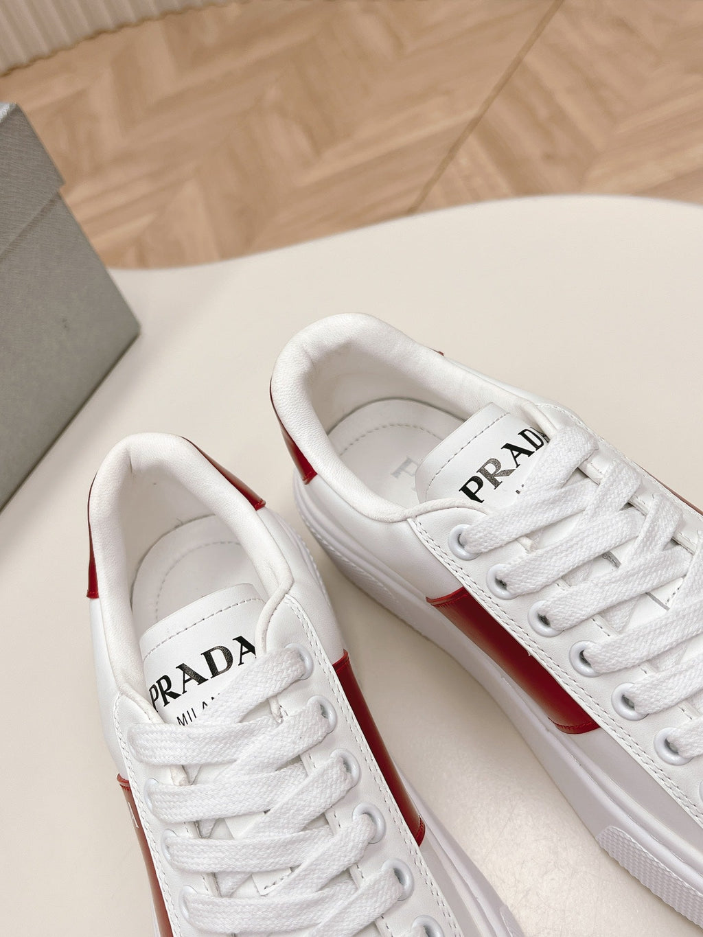 PRADA LEATHER LOGO OUTLET SNEAKERS BLACK AND CHERRY CALFSKIN