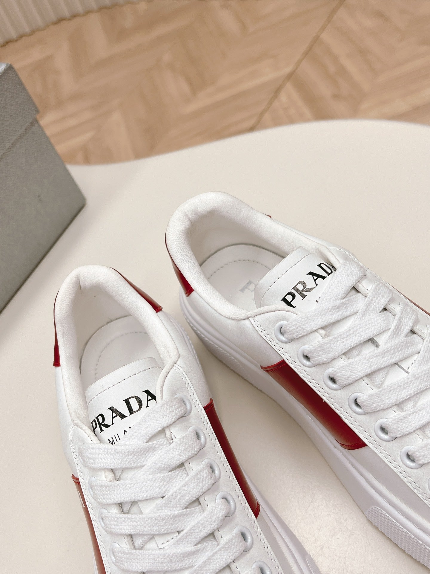 PRADA LEATHER LOGO OUTLET SNEAKERS BLACK AND CHERRY CALFSKIN