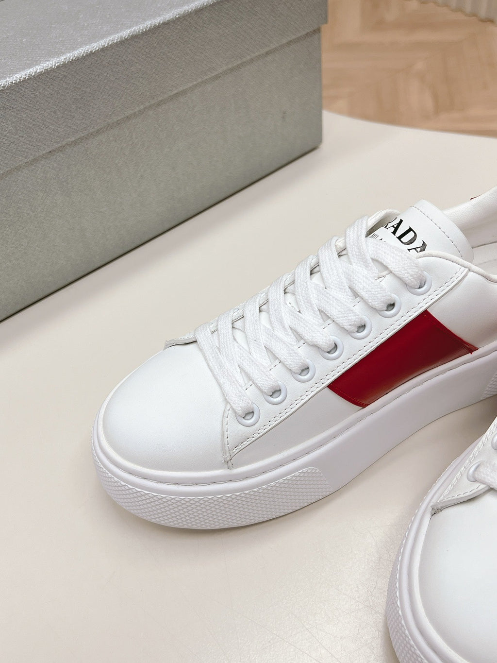 PRADA LEATHER LOGO OUTLET SNEAKERS BLACK AND CHERRY CALFSKIN