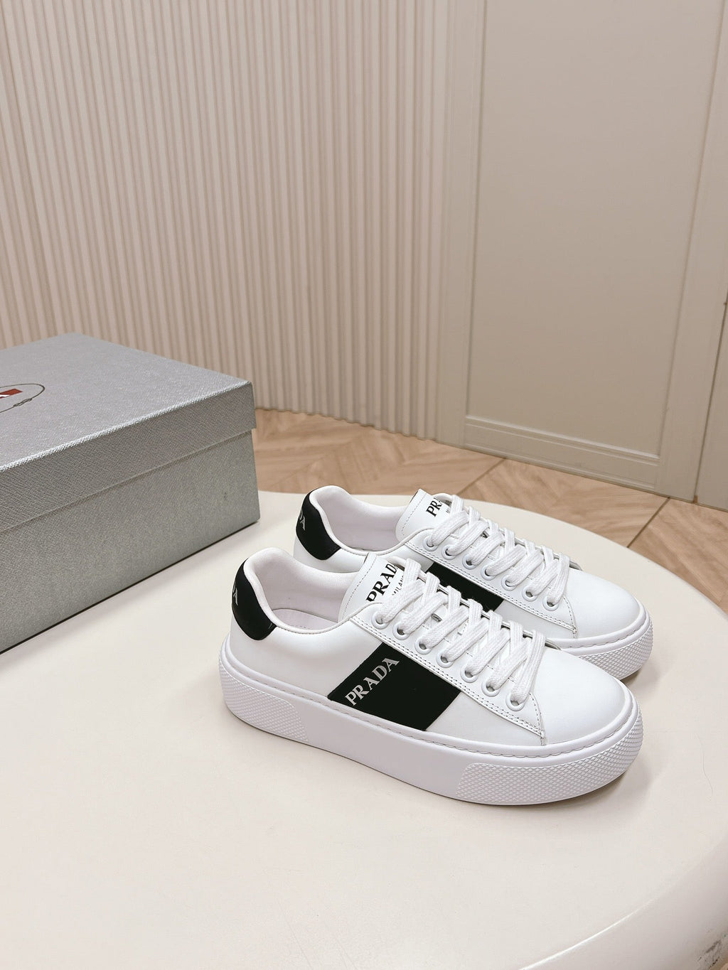 PRADA LEATHER LOGO OUTLET SNEAKERS BLACK AND WHITE CALFSKIN