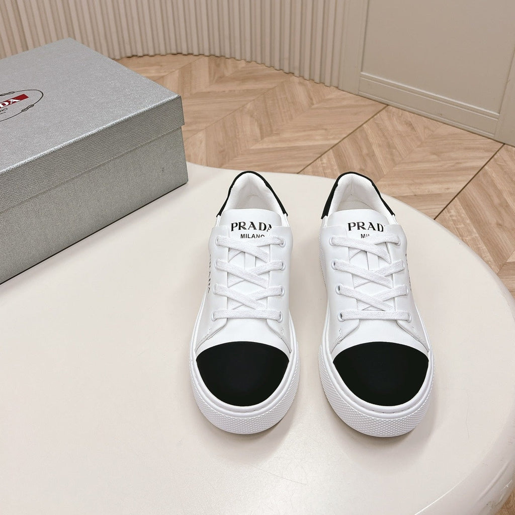 PRADA LOGO OUTLET BASIC SNEAKERS WHITE AND BLACK TOE CALFSKIN