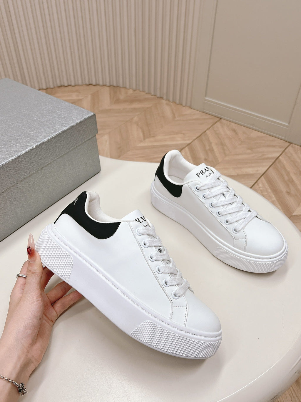 PRADA RETRO SNEAKERS WHITE AND BLACK CALFSKIN