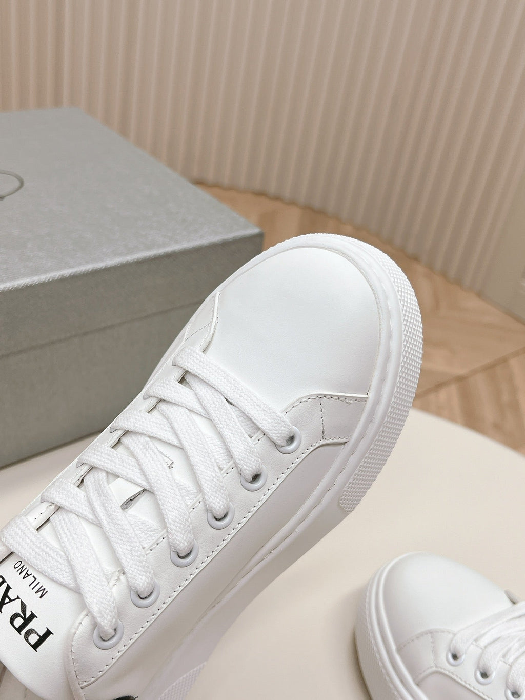 PRADA RETRO SNEAKERS WHITE AND BLACK CALFSKIN