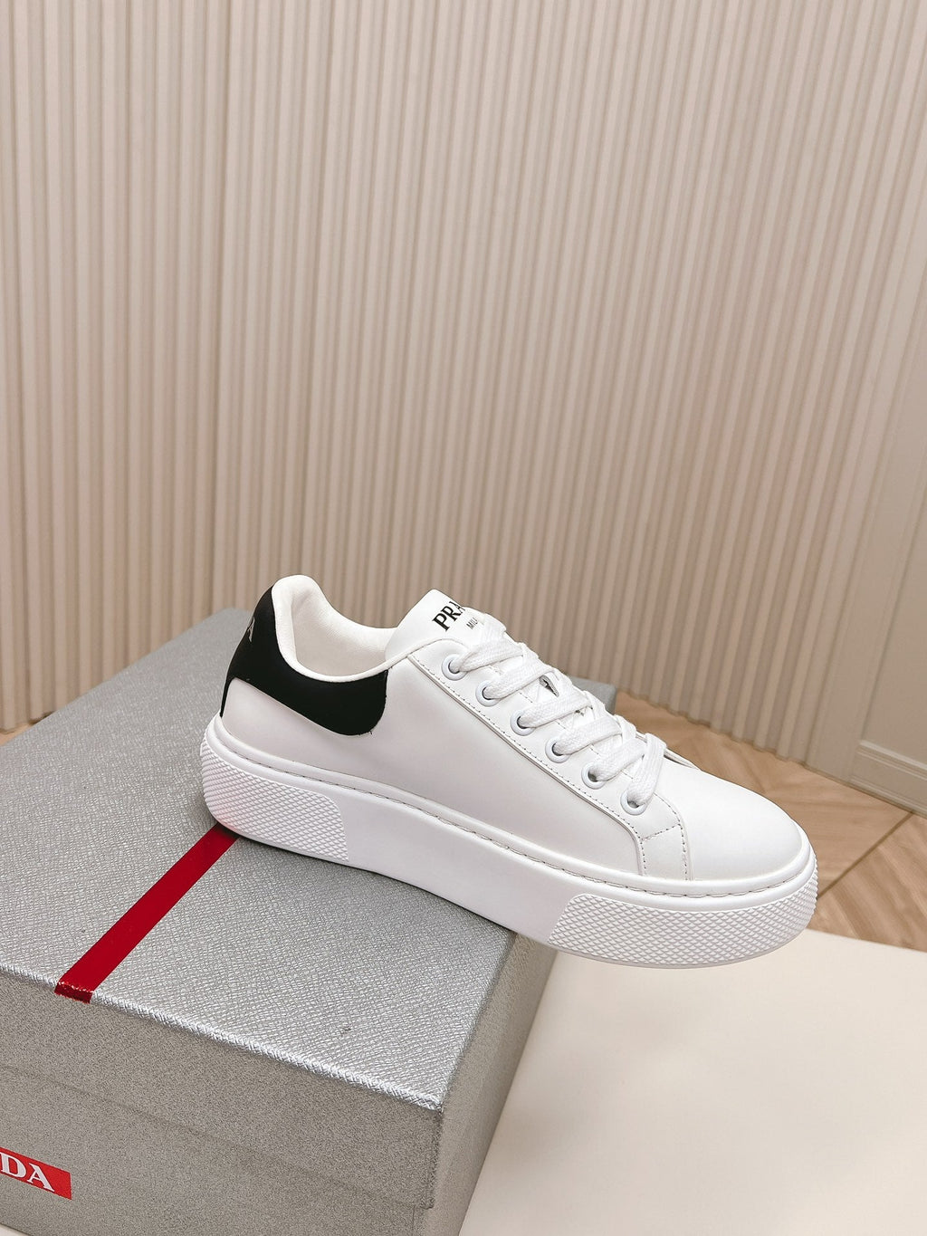 PRADA RETRO SNEAKERS WHITE AND BLACK CALFSKIN