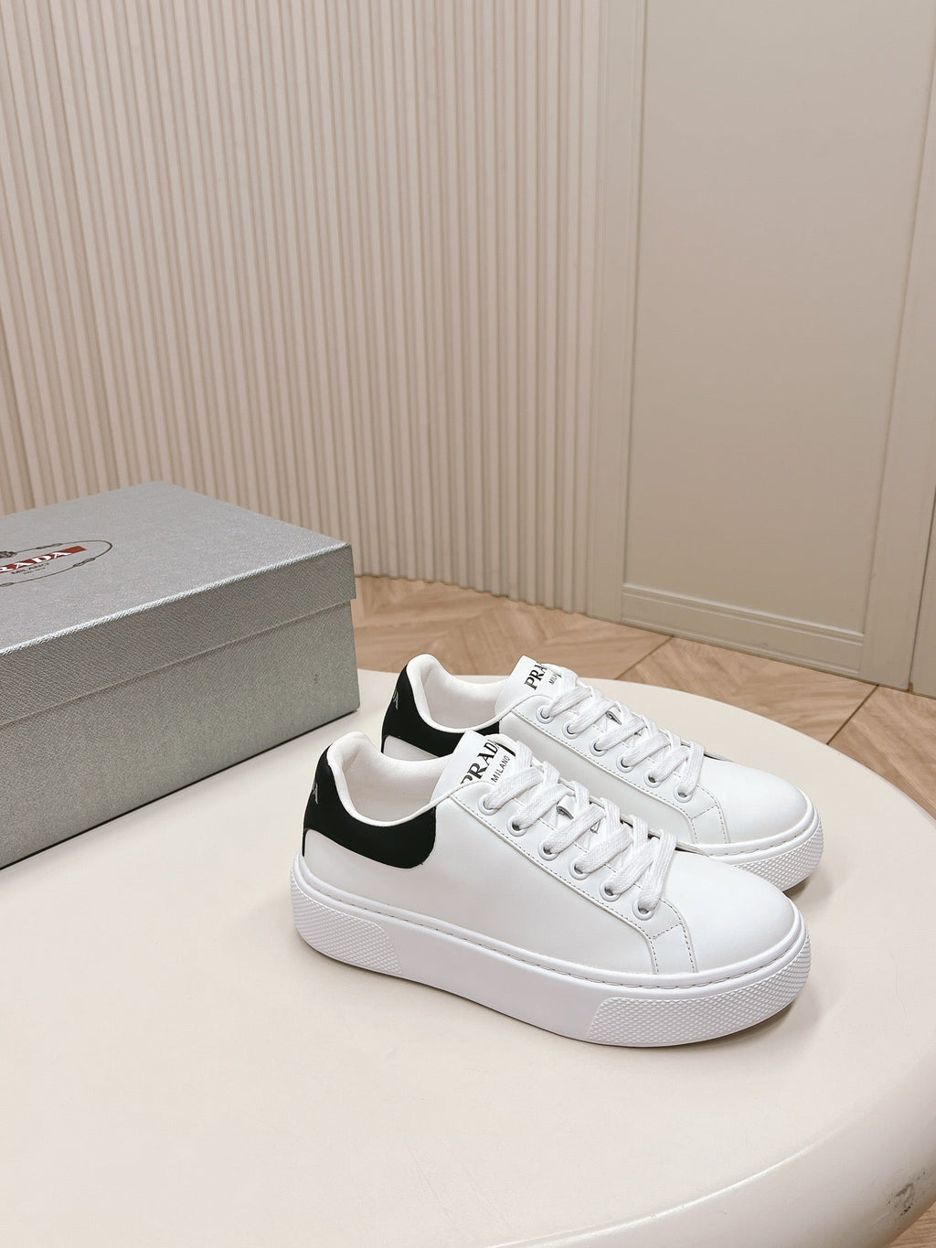 PRADA RETRO SNEAKERS WHITE AND BLACK CALFSKIN