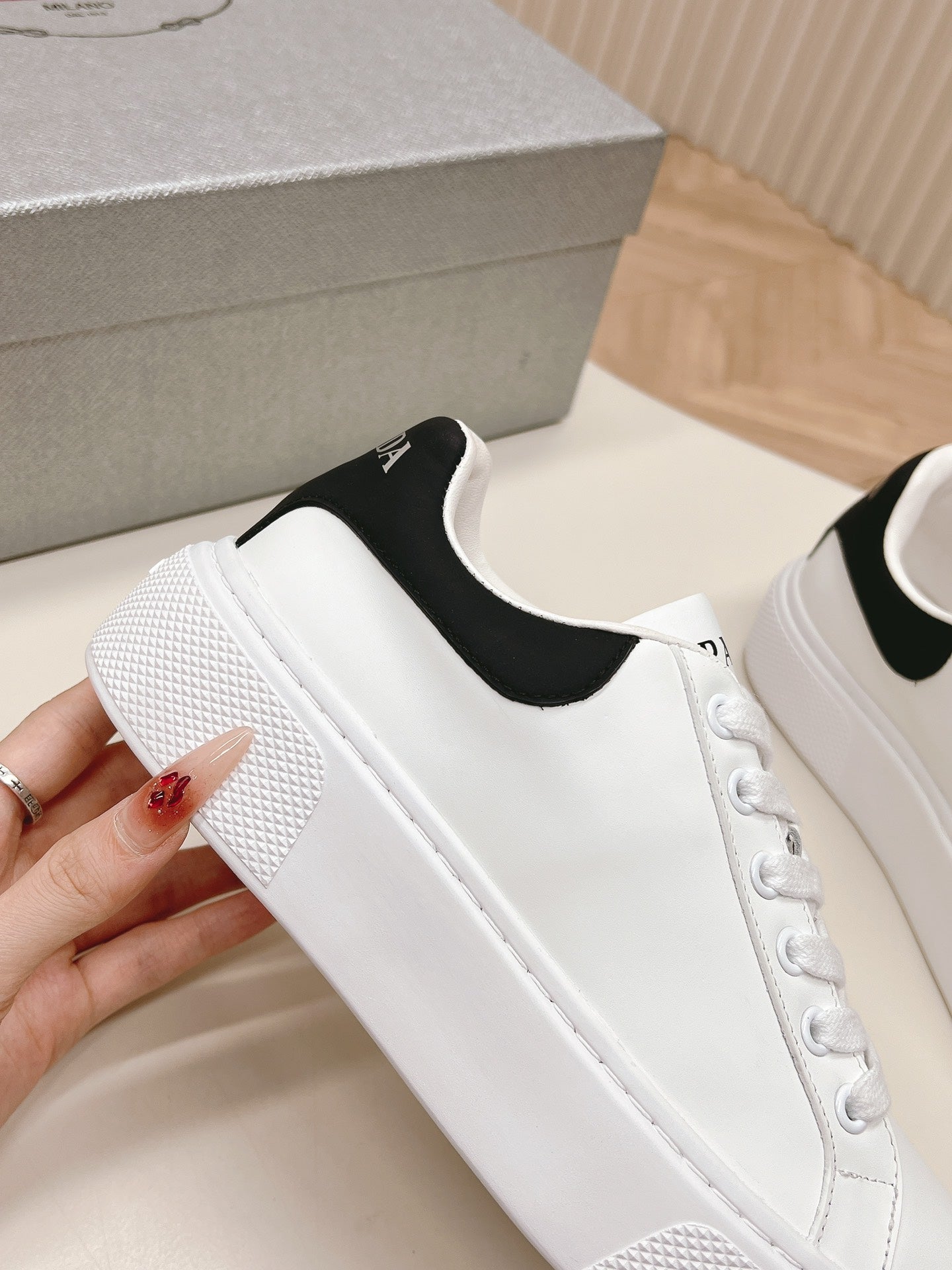 PRADA RETRO SNEAKERS WHITE AND BLACK CALFSKIN
