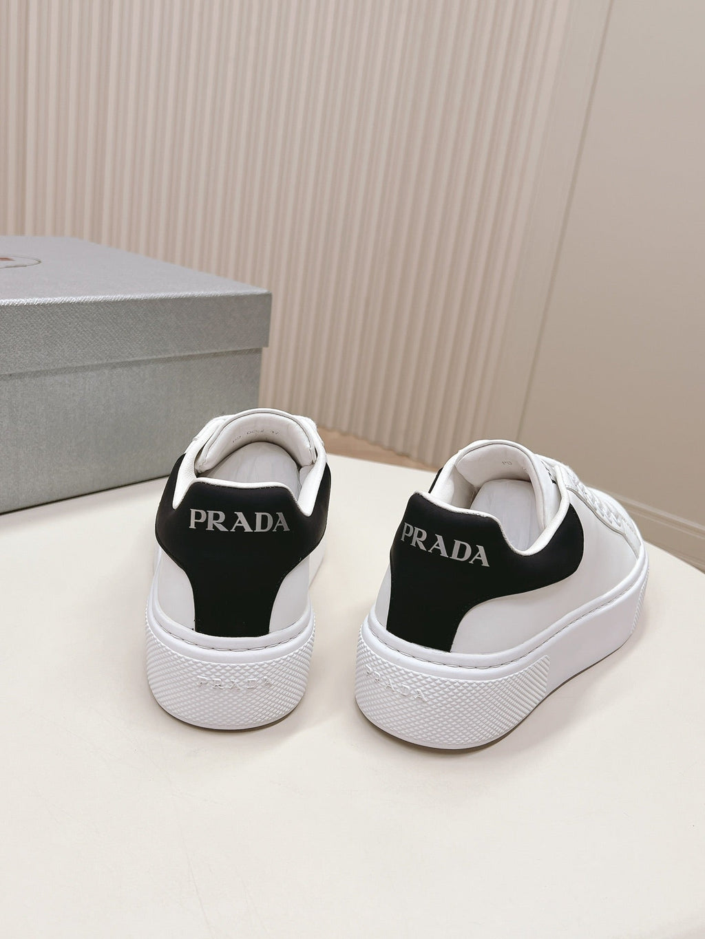 PRADA RETRO SNEAKERS WHITE AND BLACK CALFSKIN