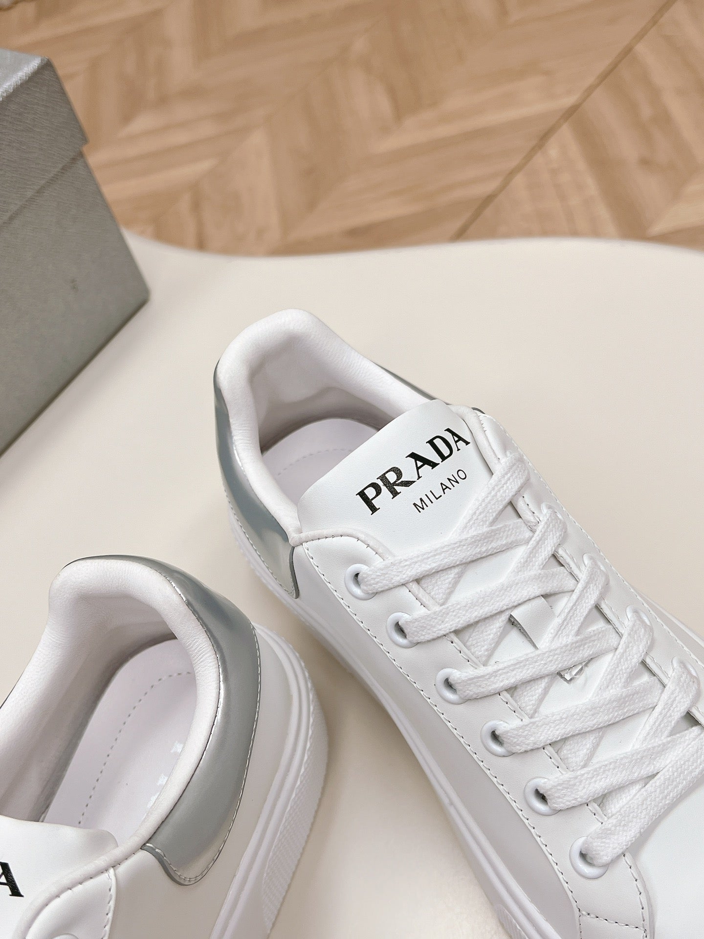 PRADA RETRO SNEAKERS WHITE AND GRAY CALFSKIN