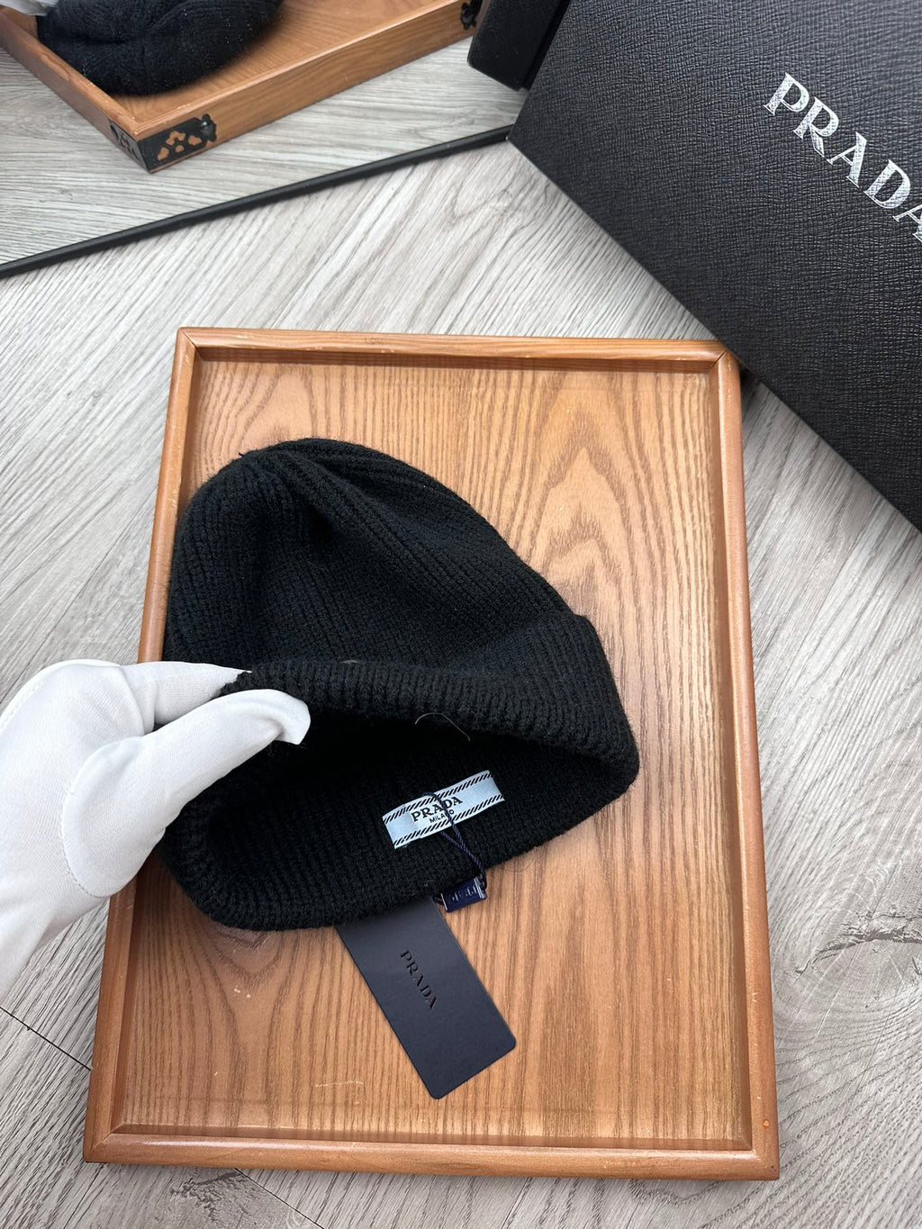 PRADA BEANIE HAT IN BLACK WOOL 332393